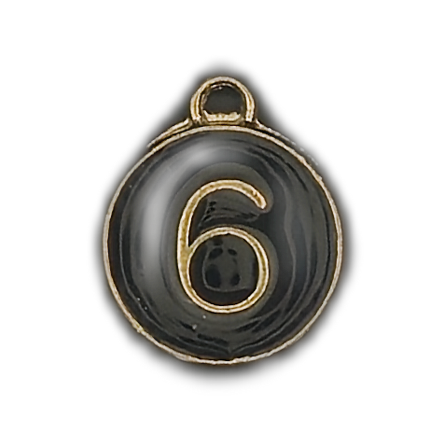 close-up of round black enamel charm with gold number 6