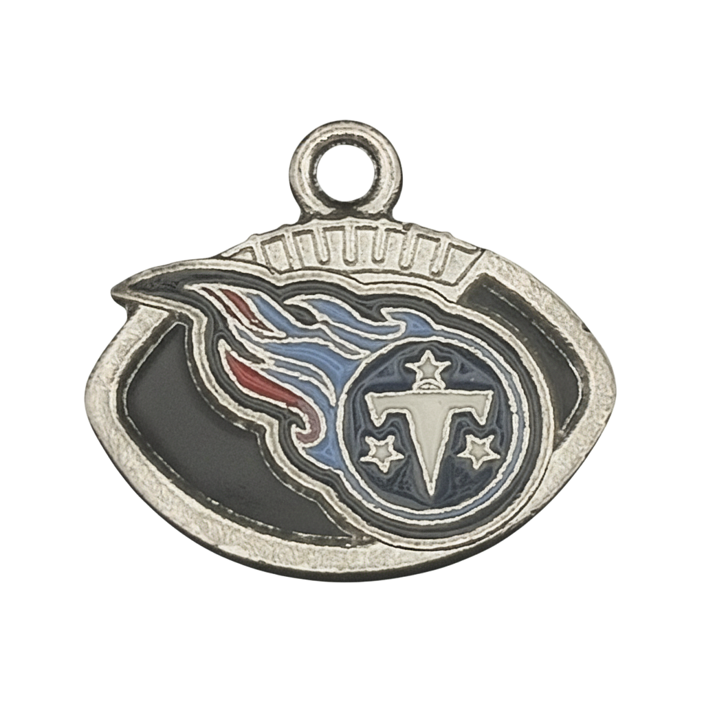 close-up of silver-tone football-shaped charm with blue and red enamel emblem