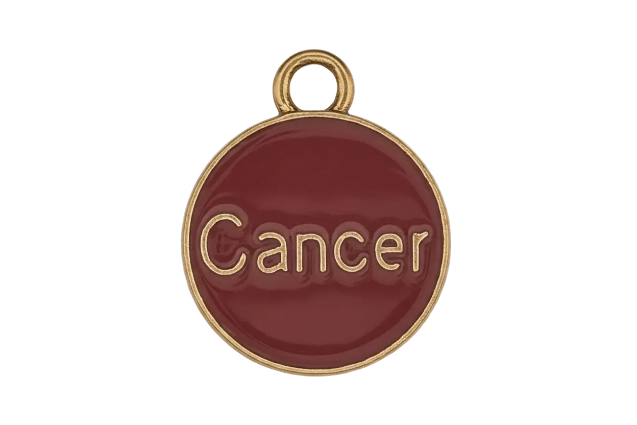 red round charm with gold rim and the word "Cancer"