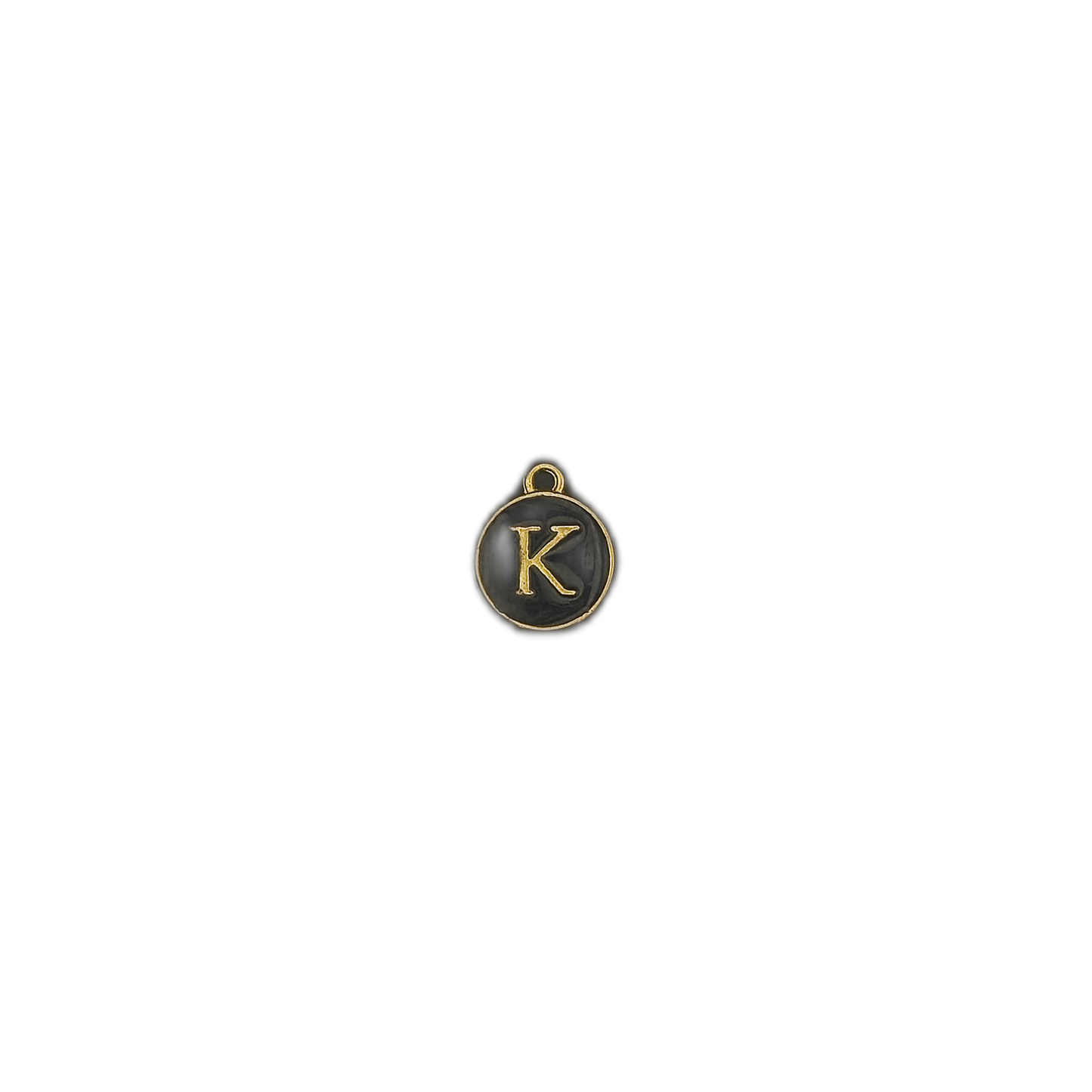small black enamel letter K charm centered on black background