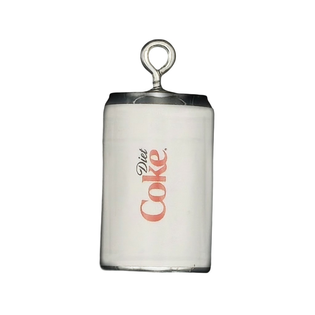 close-up of a white diet soda can charm with 'Diet Coke' text and a silver-tone top on a black background
