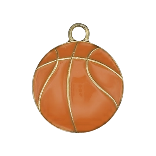 close-up of an orange enamel basketball charm with gold-tone lines on a black background