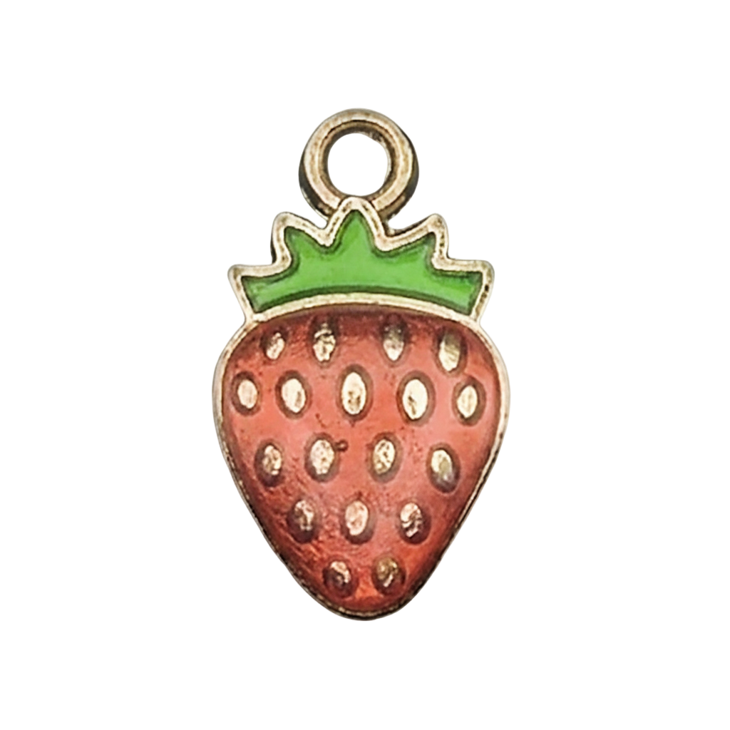 close-up of strawberry enamel charm with green top and gold outline on black background