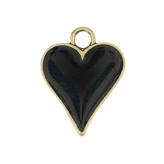 close-up black enamel heart charm with gold outline on a black background