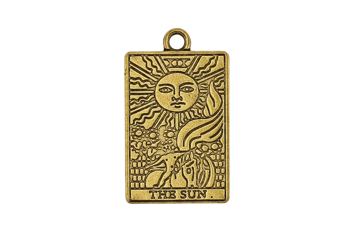 close-up of rectangular gold 'the sun' tarot charm