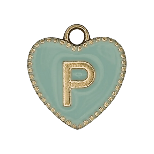 close-up of mint heart-shaped charm with gold letter P on black background