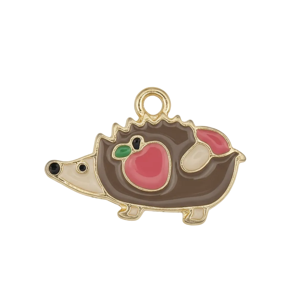close-up of gold-tone enamel hedgehog charm on black background