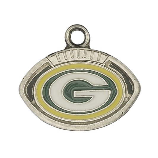 close-up of oval football charm with green and yellow G emblem
