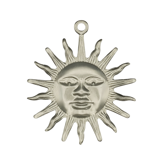 close-up silver-tone sun face charm with pointed rays on black background