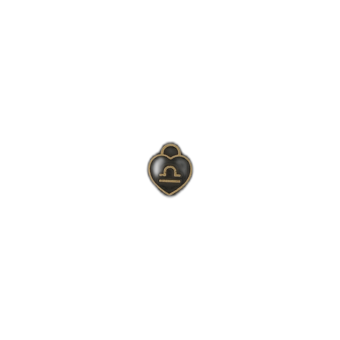 small black and gold heart-shaped Libra zodiac charm on black background