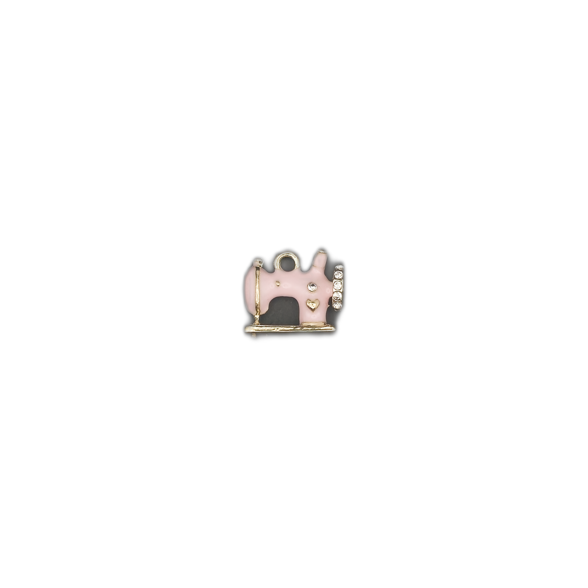 small pink sewing machine charm centered on black background