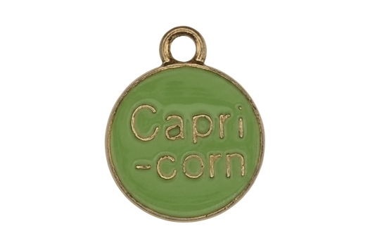 green round capricorn enamel charm with gold-tone edge