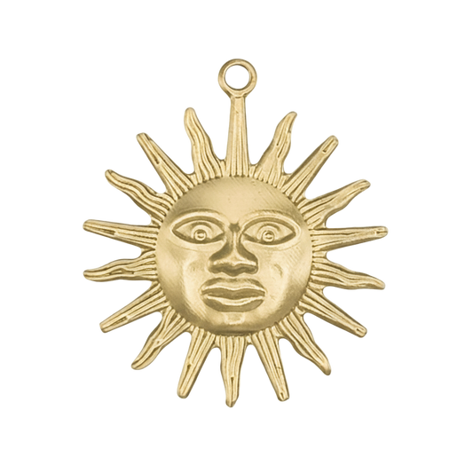 close-up of gold sun face charm with pointed rays on black background