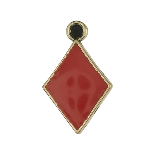 close-up of a red diamond-shaped enamel charm with a gold-tone border on a black background
