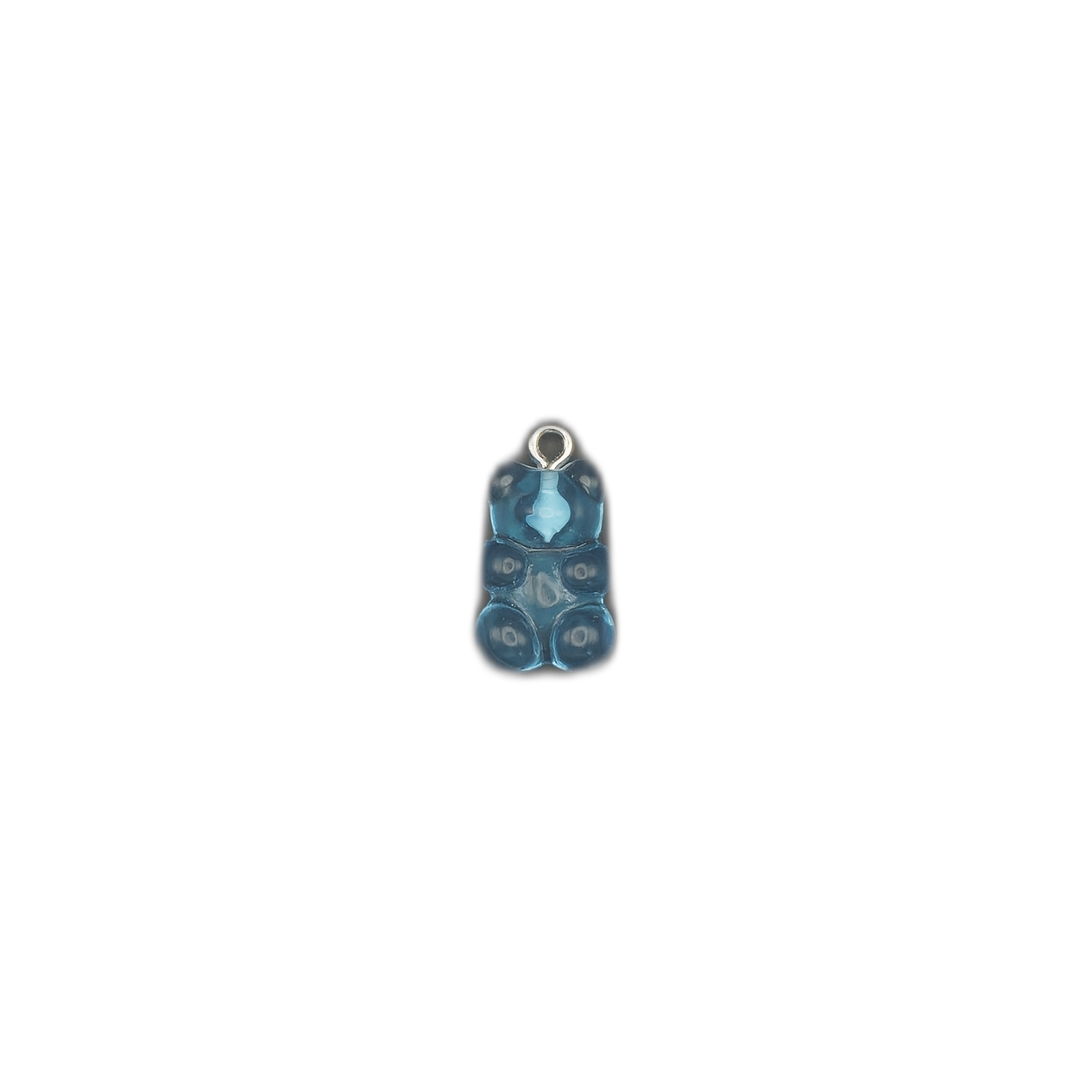 small blue gummy bear charm centered on black background
