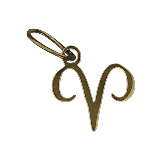 close-up of gold-tone aries zodiac charm